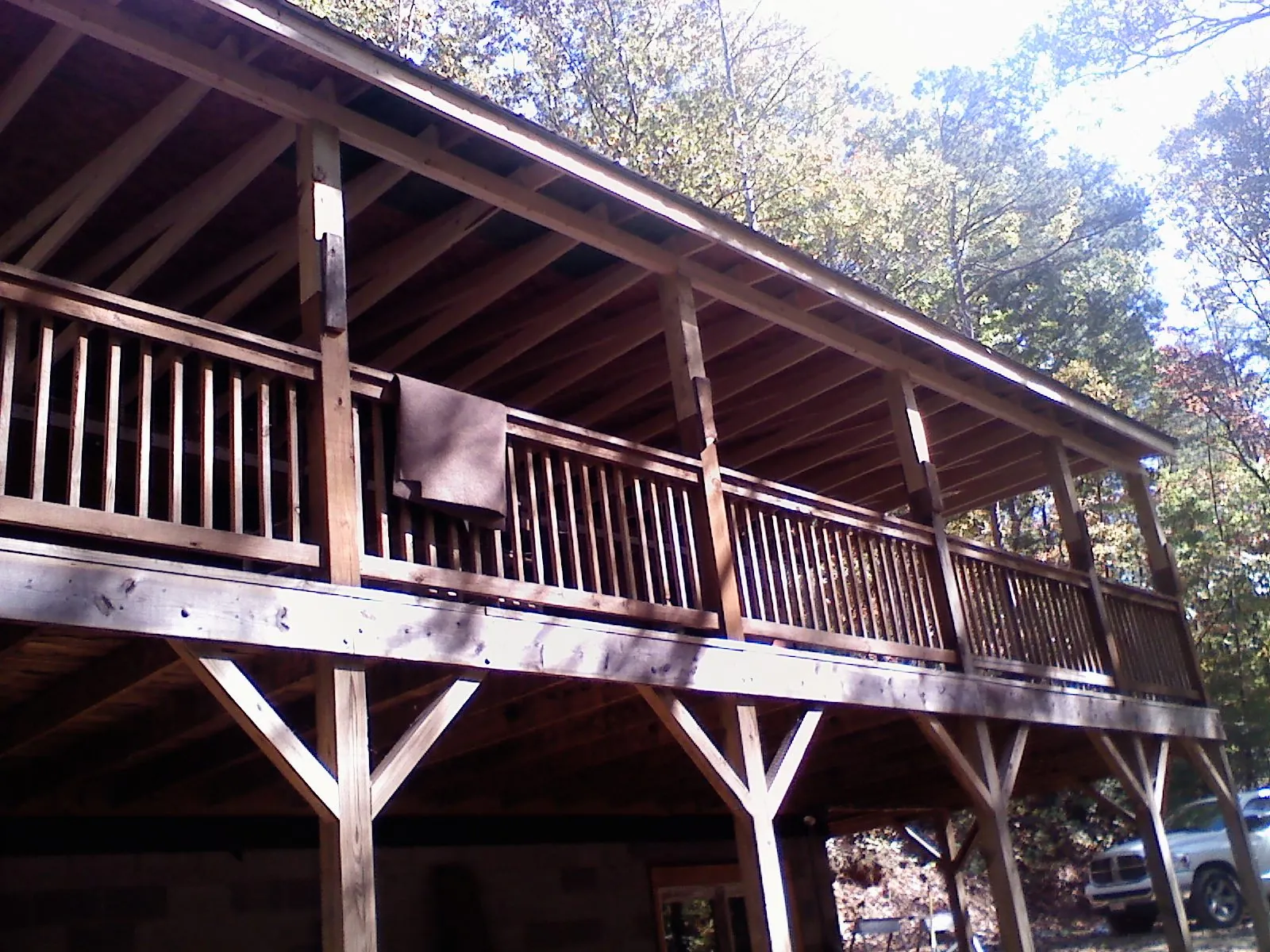 Timber framing under a new elevated porch and deck — Roof Leak Repair in Thrall by Roofing Brothers